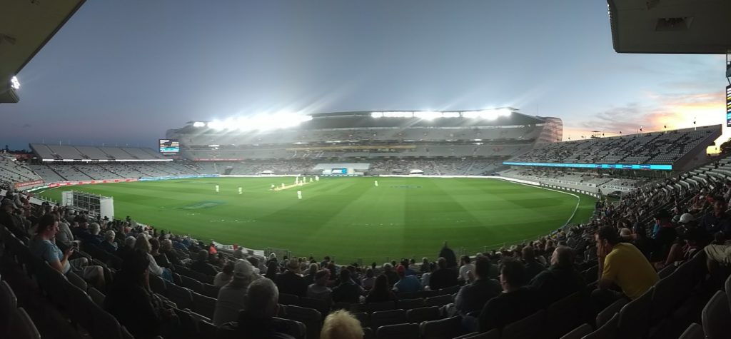 Eden Park under lights, sunset off to the right