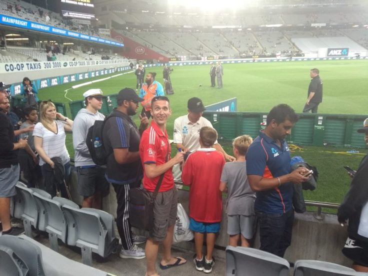 A small crowd queueing for autographs from the New Zealand team