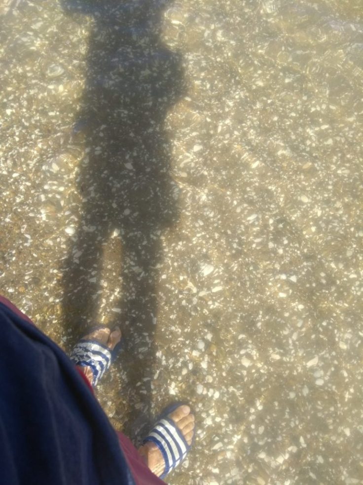 My shadow, as I paddle in the water